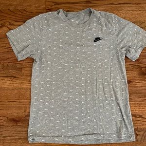 The Nike Tee - mens size small. Gray with white Nike swoosh.